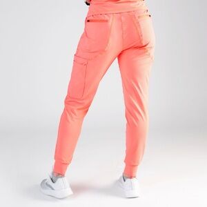 BENEFIT medical highlighter joggers peachy salmon